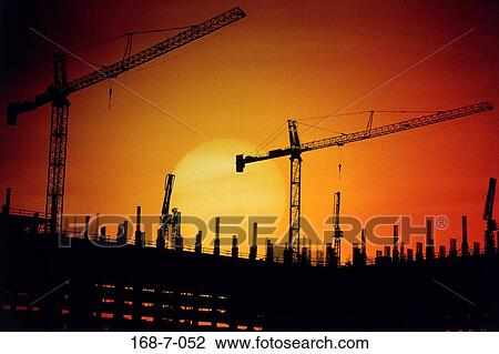 Cranes, Building, Construction, Construction, Sunset, Day, Industry View Large Photo Image Stock Image - Cranes, Building, Construction, Construction, Sunset, Day, Industry. Fotosearch