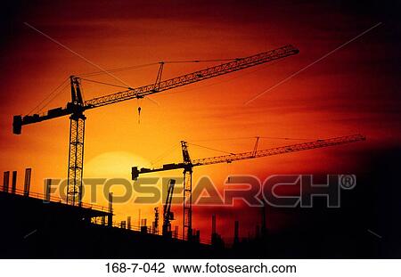 Cranes, Construction, Sunrise, Industry, Crane, Outside, Silhouette View Large Photo Image Stock Image - Cranes, Construction, Sunrise, Industry, Crane, Outside, Silhouette. Fotosearch