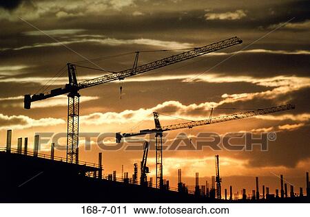 Cranes, Outside, Silhouette, Frame, Sunrise, Building, Industrial View Large Photo Image Stock Image - Cranes, Outside, Silhouette, Frame, Sunrise, Building, Industrial. Fotosearch