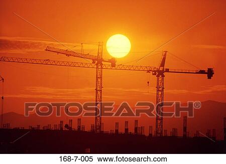 Industry, Construction, Sunrise, Industrial, Cranes, Sunset, Cranes View Large Photo Image Stock Photography - Industry, Construction, Sunrise, Industrial, Cranes, Sunset, Cranes. Fotosearch