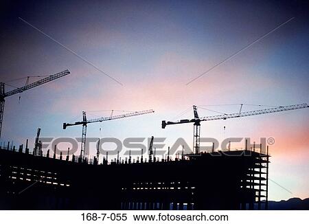 Outdoors, Sunrise, Industry, Industrial, Cranes, Crane, Site View Large Photo Image Stock Photography - Outdoors, Sunrise, Industry, Industrial, Cranes, Crane, Site. Fotosearch