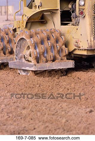 Earth, Digging, Daylight, Commercial, Construction, Mover, Macinery View Large Photo Image Stock Photography - Earth, Digging, Daylight, Commercial, Construction, Mover, Macinery. Fotosearch