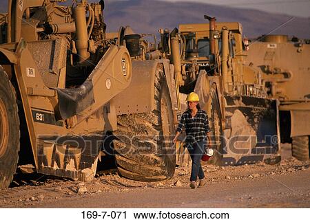 Earth, Tire, Workers, Construction, Hardhat, Outdoors, Moving View Large Photo Image Stock Image - Earth, Tire, Workers, Construction, Hardhat, Outdoors, Moving. Fotosearch