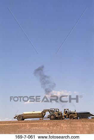 Earth, Working, Macinery, Outdoors, Site, Moving, Construction View Large Photo Image Stock Image - Earth, Working, Macinery, Outdoors, Site, Moving, Construction. Fotosearch