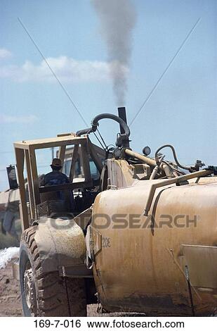Stock Photograph - Mover, Hat, Moving, Commercial, Work, Site, Equipment. Fotosearch