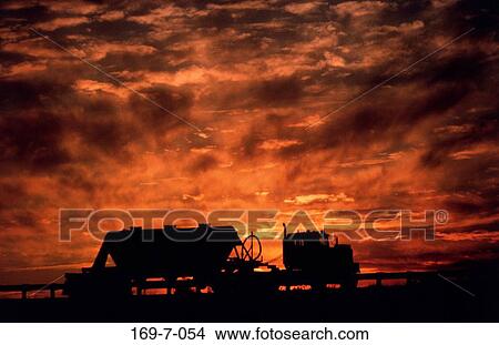 Sunrise, Building, Equipment, Mover, Working, Outside, Truck View Large Photo Image Picture - Sunrise, Building, Equipment, Mover, Working, Outside, Truck. Fotosearch