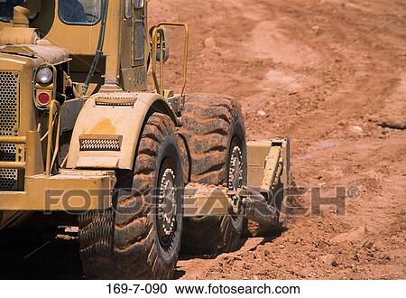 Working, Day, Machinery, Building, Tire, Outdoors, Heavy View Large Photo Image Stock Image - Working, Day, Machinery, Building, Tire, Outdoors, Heavy. Fotosearch