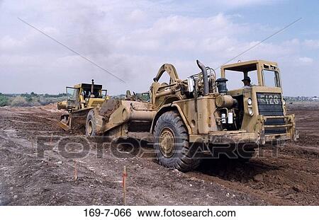 Working, Equipment, Moving, Dirt, Moving, Commercial, Worker View Large Photo Image Stock Photograph - Working, Equipment, Moving, Dirt, Moving, Commercial, Worker. Fotosearch