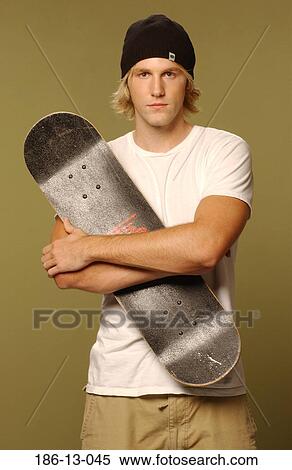 Stock Photography - Character, Stereo, Skateboard, Camera, Individuality, Untypical. Fotosearch