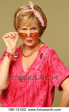 Stock Image - Individual, Stereotypical, Sunglasses, 40's, Glasses, Untypical, Portrait. Fotosearch