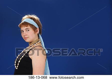 Stock Photo - Looking, Female, Necklace, Portrait, Untypical, Individuality, Camera. Fotosearch