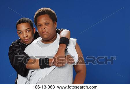 Stock Image - Looking, Friends, Camera, Stereo, Male, American, Cool. Fotosearch