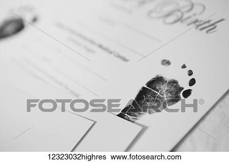 A baby's footprint in ink in a baby book; Portland, Oregon, United States of America View Large Photo Image Stock Photograph - A baby's footprint in ink in a baby book; Portland, Oregon, United States of America. Fotosearch