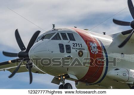 Stock Photograph - A Coast Guard plane prepares to land; Astoria, Oregon, United States of America. Fotosearch