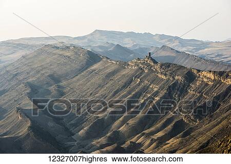 A mountain ridge near the David Gareja monastery complex at the disputable Georgia�Azerbaijan border with clearly visible remnants of ancient monastery tower; Kakheti, Georgia View Large Photo Image Stock Photograph - A mountain ridge near the David Gareja monastery complex at the disputable Georgia�Azerbaijan border with clearly visible remnants of ancient monastery tower; Kakheti, Georgia. Fotosearch