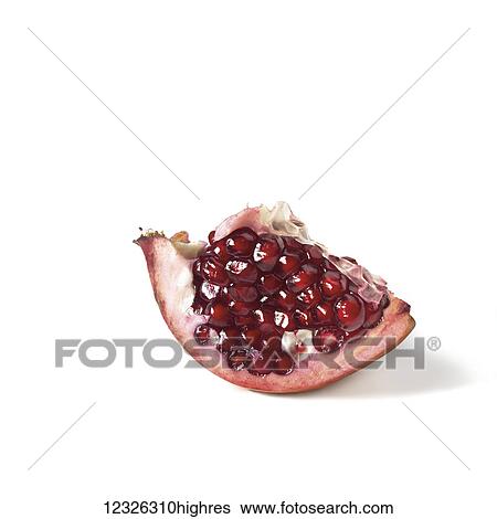 Stock Photograph - A piece of pomegranate with seeds on a white background. Fotosearch