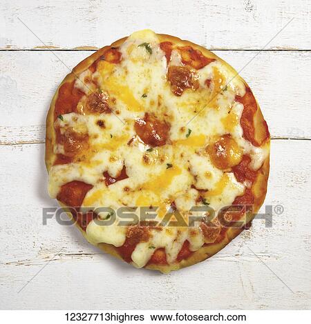 A pizza with melted cheese on a white wooden surface View Large Photo Image Stock Photograph - A pizza with melted cheese on a white wooden surface. Fotosearch