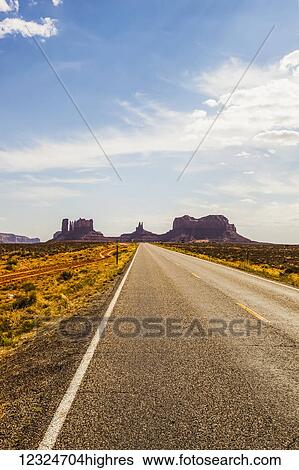 A road leading to rugged rock formations in the desert; Arizona, United States of America View Large Photo Image Stock Photograph - A road leading to rugged rock formations in the desert; Arizona, United States of America. Fotosearch