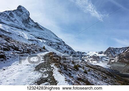 Stock Photograph - A trail featuring the Matterhorn, near Zermatt; Valais, Switerzland. Fotosearch