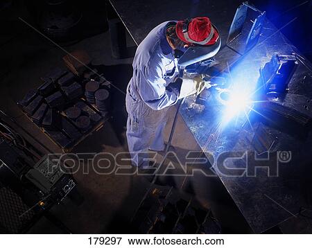 Stock Photo - A welder at work. Fotosearch