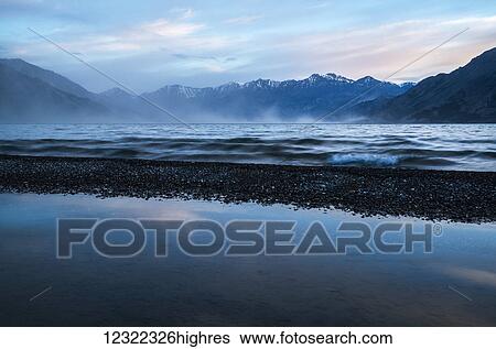Stock Photograph - A windy evening on Kluane Lake, near Haines Junction; Yukon, Canada. Fotosearch