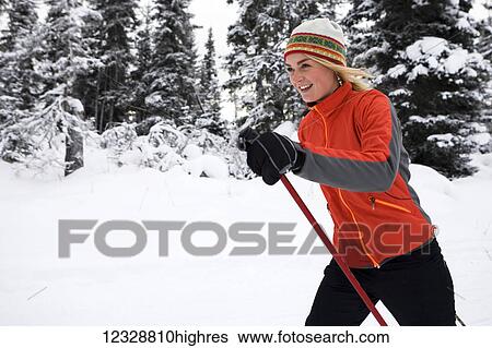 A young woman cross country skiing, Ohlson Mountain; Alaska, United States of America View Large Photo Image Stock Photograph - A young woman cross country skiing, Ohlson Mountain; Alaska, United States of America. Fotosearch