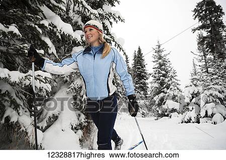 A young woman cross country skiing, Ohlson Mountain; Alaska, United States of America View Large Photo Image Stock Photograph - A young woman cross country skiing, Ohlson Mountain; Alaska, United States of America. Fotosearch