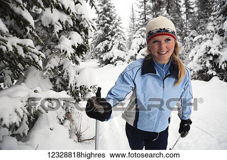A young woman cross country skiing, Ohlson Mountain; Alaska, United States of America View Large Photo Image Stock Photograph - A young woman cross country skiing, Ohlson Mountain; Alaska, United States of America. Fotosearch