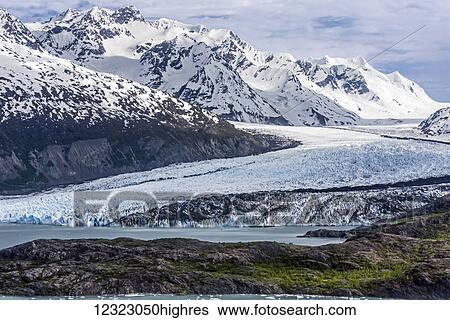 Aerial view of Colony Glacier with Chugach Mountains in background and Lake George with Colony Point in foreground, South-central Alaska; Alaska, United States of America View Large Photo Image Stock Photograph - Aerial view of Colony Glacier with Chugach Mountains in background and Lake George with Colony Point in foreground, South-central Alaska; Alaska, United States of America. Fotosearch