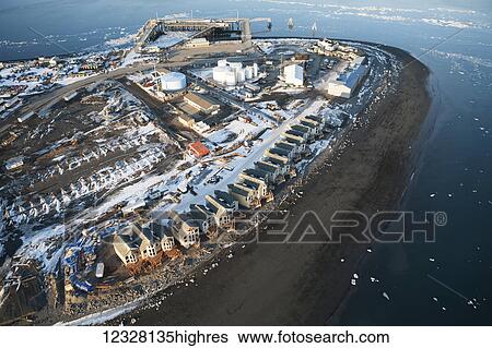 Stock Photograph - Aerial view of Land's End hotel and condos in winter on the Homer Spit, Southcentral Alaska, USA. Fotosearch