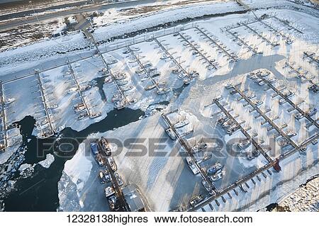 Aerial view of the Homer small boat harbor in winter, Southcentral Alaska, USA View Large Photo Image Stock Photograph - Aerial view of the Homer small boat harbor in winter, Southcentral Alaska, USA. Fotosearch