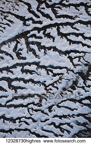 Aerial view of the landscape in winter with unique branching patterns, Kachemak Bay; Alaska, United States of America View Large Photo Image Stock Photograph - Aerial view of the landscape in winter with unique branching patterns, Kachemak Bay; Alaska, United States of America. Fotosearch