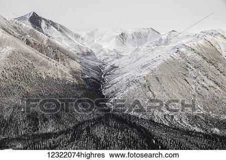 Stock Photograph - Aerial view of the Ogilvie Mountains while flying along the Dempster Highway; Yukon, Canada. Fotosearch