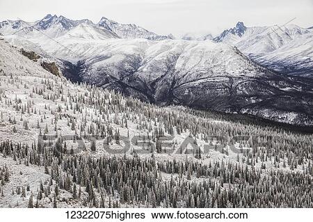 Aerial view of the Ogilvie Mountains while flying along the Dempster Highway; Yukon, Canada View Large Photo Image Stock Photograph - Aerial view of the Ogilvie Mountains while flying along the Dempster Highway; Yukon, Canada. Fotosearch