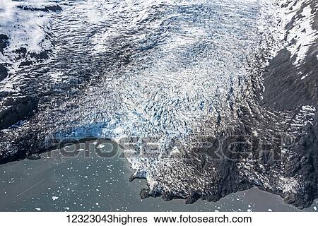 Aerial view of the terminus of the west branch of Columbia Glacier, Prince William Sound, South-central Alaska; Alaska, United States of America View Large Photo Image Stock Photograph - Aerial view of the terminus of the west branch of Columbia Glacier, Prince William Sound, South-central Alaska; Alaska, United States of America. Fotosearch