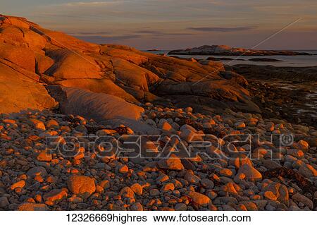 Stock Photograph - Along the coastal High Head Trail at sunset; Prospect, Nova Scotia, Canada. Fotosearch