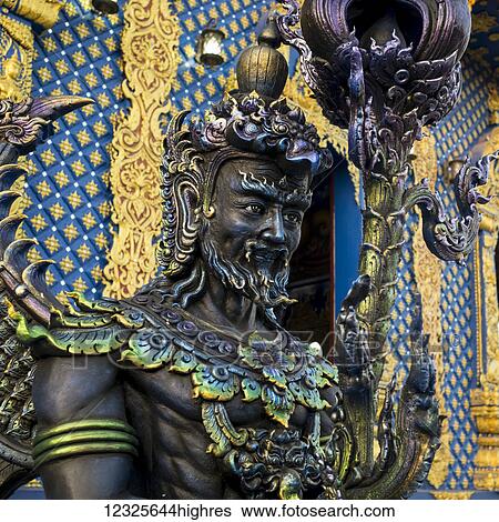 An ornate statue and facade at Rong Suea Ten Temple; Mueang Chiang Rai, Chang Wat Chiang Rai, Thailand View Large Photo Image Stock Photograph - An ornate statue and facade at Rong Suea Ten Temple; Mueang Chiang Rai, Chang Wat Chiang Rai, Thailand. Fotosearch