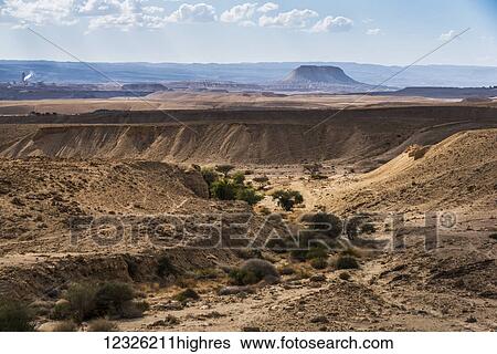 Stock Photograph - Arid landscape of the Negev desert; Har Hanegev Hatzfoni, South District, Israe. Fotosearch