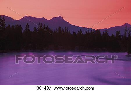 Athabasca River and Mountains at Dusk Jasper National Park Alberta Canada View Large Photo Image Stock Photo - Athabasca River and Mountains at Dusk Jasper National Park Alberta Canada. Fotosearch