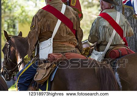 Back side of two older gentlemen riding horses in old leather jackets; Calgary, Alberta, Canada View Large Photo Image Stock Photograph - Back side of two older gentlemen riding horses in old leather jackets; Calgary, Alberta, Canada. Fotosearch