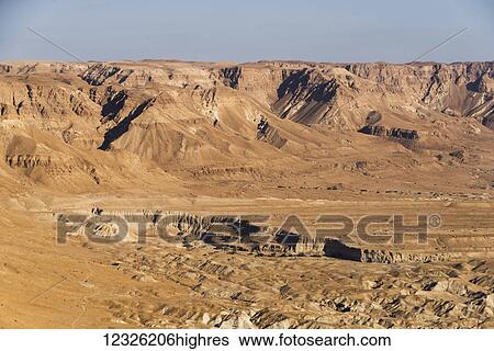 Barren and arid landscape of the Judaean Desert; South District, Israel View Large Photo Image Stock Photograph - Barren and arid landscape of the Judaean Desert; South District, Israel. Fotosearch