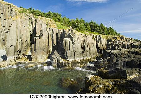 Stock Photograph - Basalt rock cliffs, Bay of Fundy; Brier Island, Nova Scotia, Canada. Fotosearch