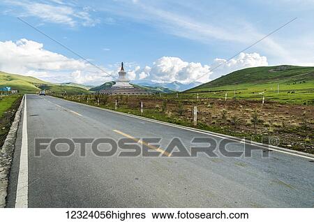 Beautiful landscape from Daocheng Surrounders, a Tibetan stupa on the background, west of Sichuan province; Daocheng, Sichuan, China View Large Photo Image Stock Photograph - Beautiful landscape from Daocheng Surrounders, a Tibetan stupa on the background, west of Sichuan province; Daocheng, Sichuan, China. Fotosearch