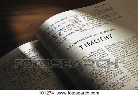 Picture - Bible open to First Timothy. Fotosearch