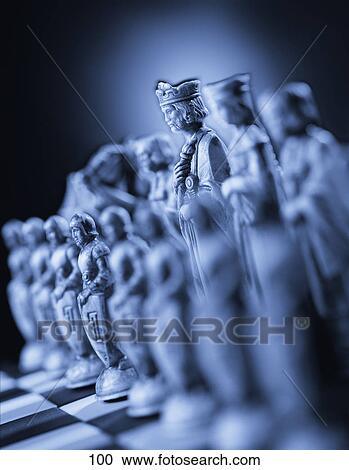 Stock Image - Black and white chess set. Fotosearch