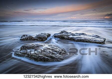 Black rocks on North East coast; South Shields, Tyne and Wear, England View Large Photo Image Stock Photograph - Black rocks on North East coast; South Shields, Tyne and Wear, England. Fotosearch