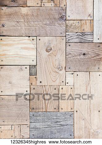 Blocks of eco-friendly natural reclaimed wood screwed together to form a flat pattern wall surface; Honolulu, Oahu, Hawaii, United States of America View Large Photo Image Stock Photograph - Blocks of eco-friendly natural reclaimed wood screwed together to form a flat pattern wall surface; Honolulu, Oahu, Hawaii, United States of America. Fotosearch