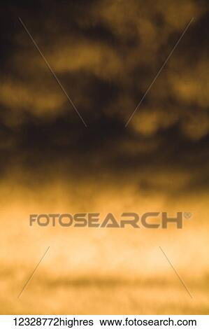 Stock Photograph - Blur of sunset sky; Alaska, United States of America. Fotosearch