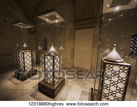 Stock Photograph - Brass dishes and coverings on display in the Palace of the Shirvanshahs; Baku, Azerbaijan. Fotosearch