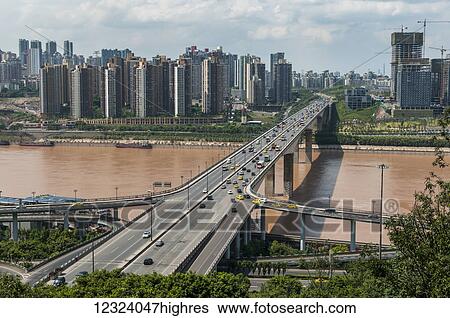 Stock Photograph - Bridge crossing Yangtze river; Chongqing, China. Fotosearch